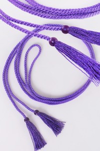 Cingulum with violet tassels