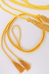 Cingulum with yellow tassels